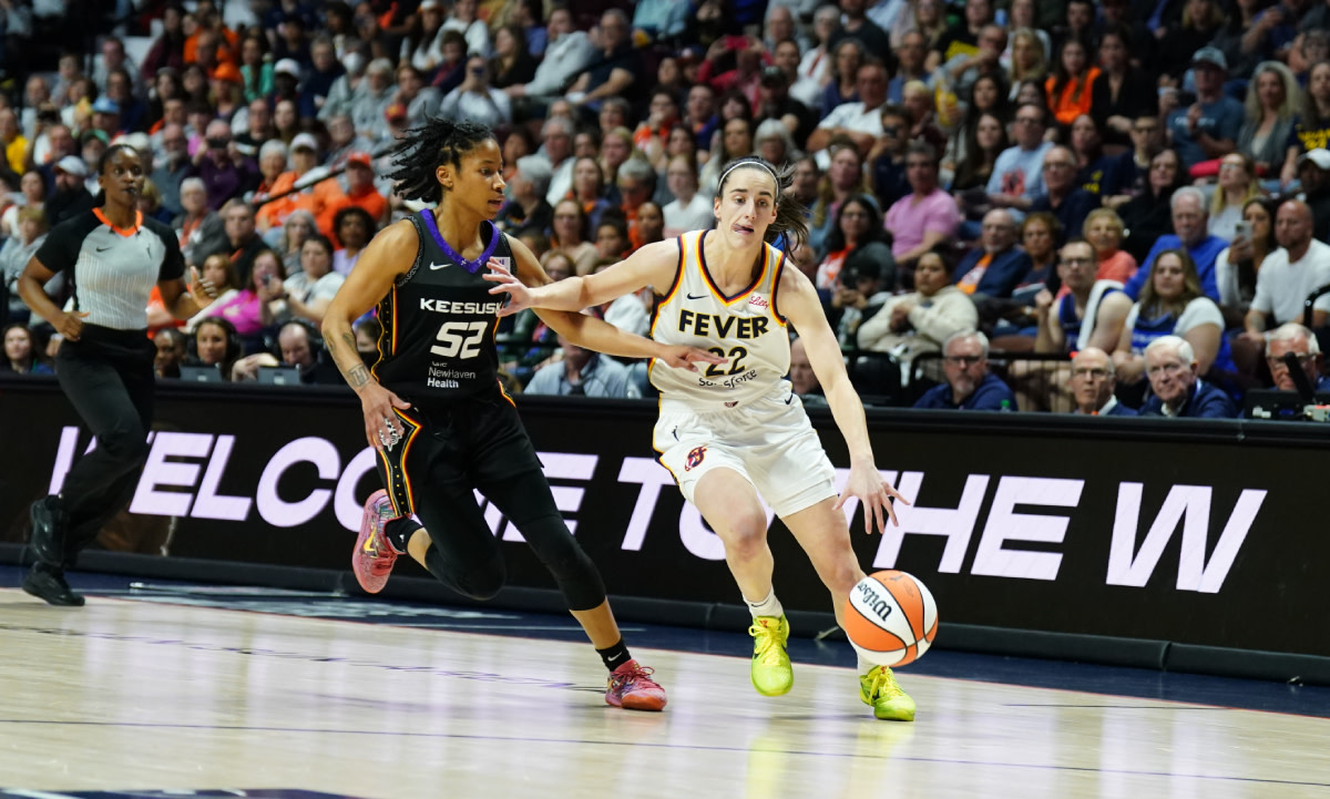 Caitlin Clark Scores 20 in Debut Against Sun